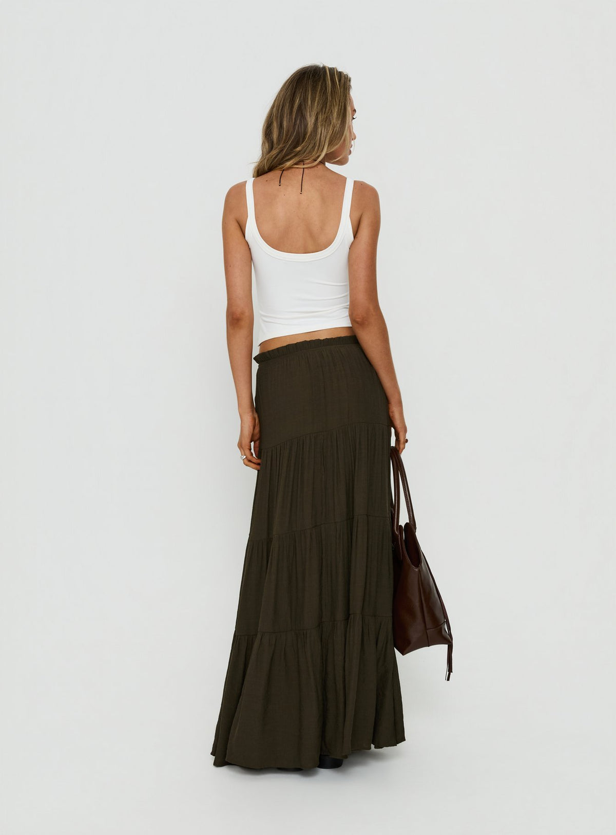 Crafted in the Mya Maxi Skirt Chocolate womens-skirts with layered relaxed fit back view of model wearing Princess Polly