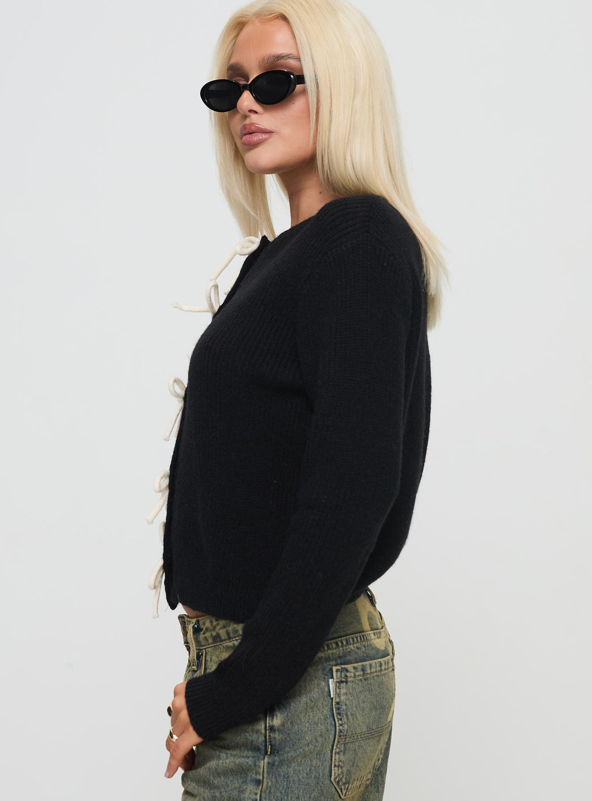 side view of model wearing Princess Polly Rosalee Cardigan Black / White Cropped Jumpers Jumpers 