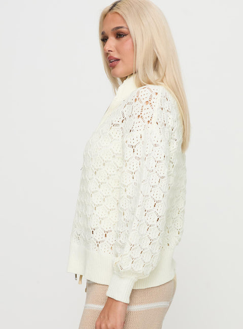 side view of model wearing Princess Polly Sirena Zip Through Knit Sweater Cream Jumpers 