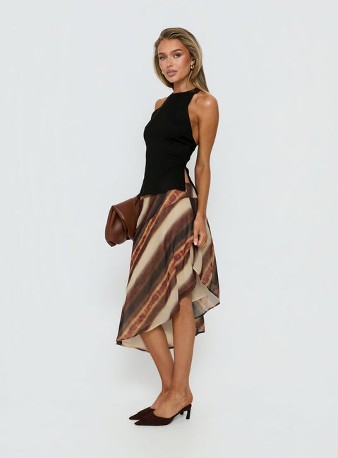 Explore the Esmira Asymmetrical Midi Skirt Brown Stripe Tall in womens-skirts with midi length detail view of model wearing