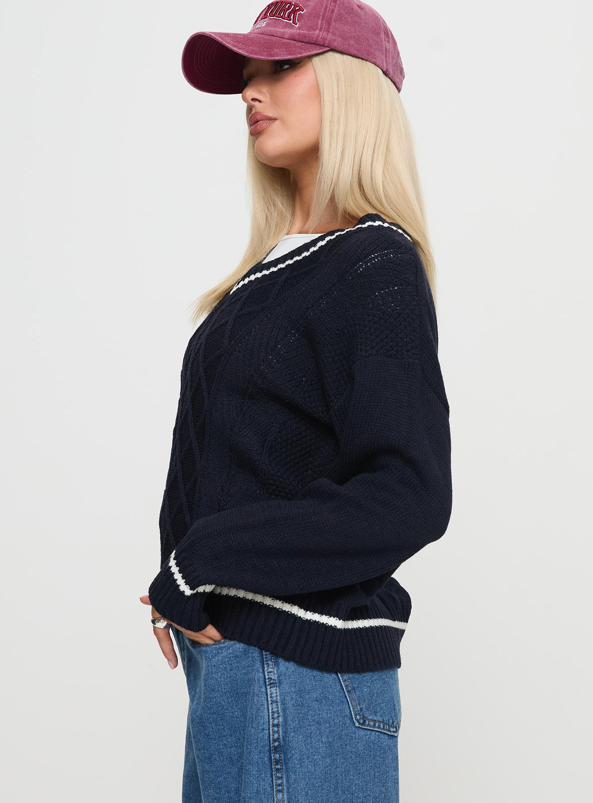 side view of model wearing Princess Polly Covina V Neck Knit Sweater Navy Jumpers 