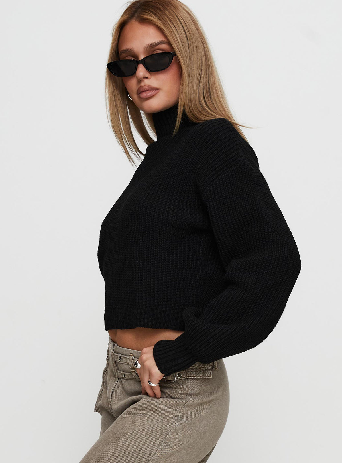 side view of model wearing Princess Polly Sayge Mock Neck Knit Sweater Black cropped Jumpers 