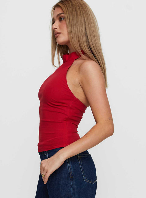 side view of model wearing Princess Polly Merril Halter Top Red Sleeveless High Neck 