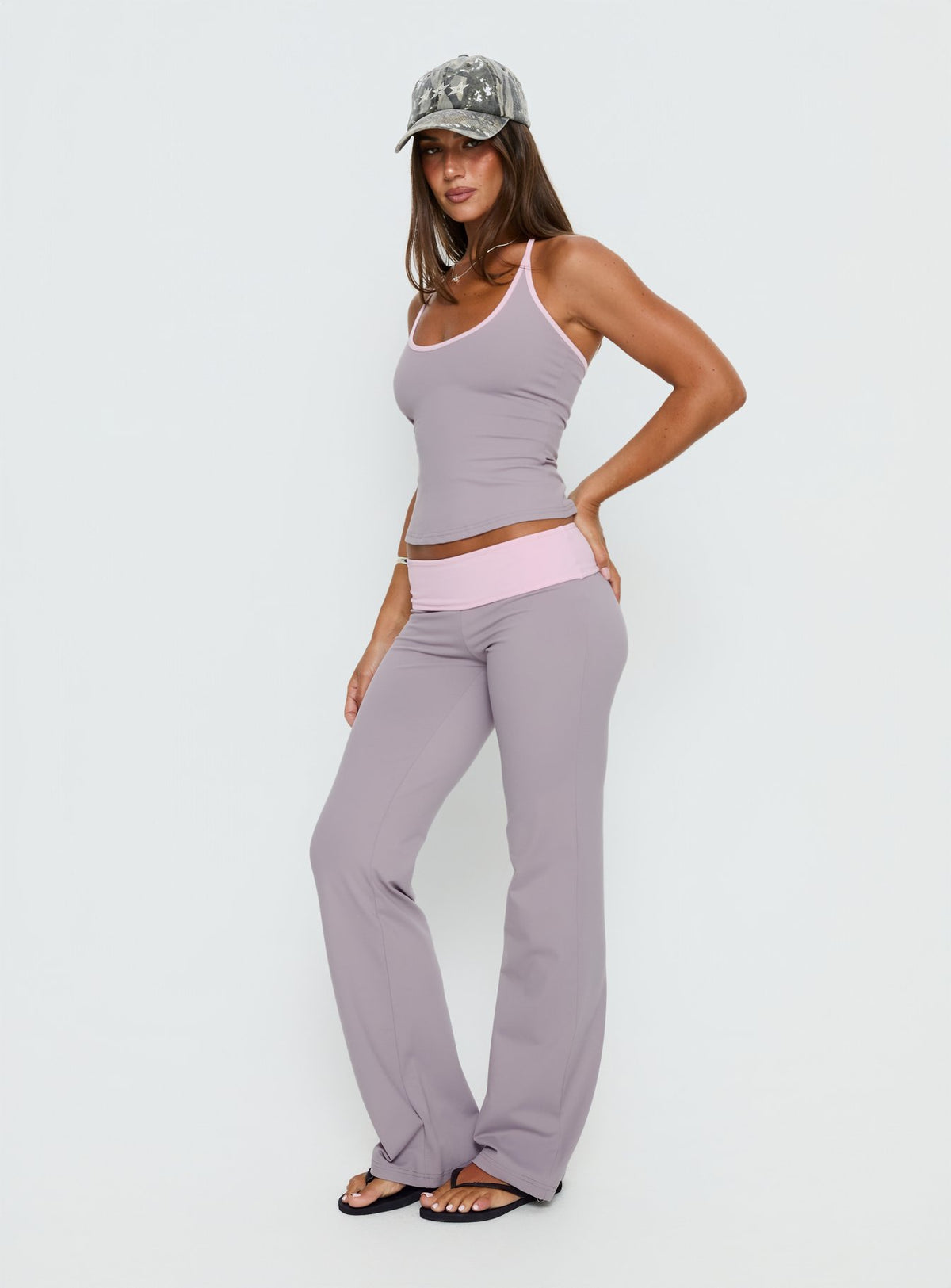 side view of model wearing Princess Polly Kobee Jersey Flare Pants Slate / Dusty Pink Mid Rise Pants Pants 