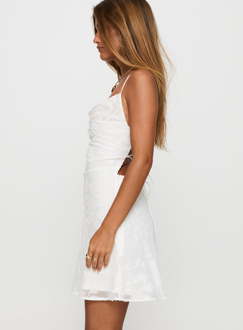 side view of model wearing Princess Polly Celena Burnout Mini Dress White / Floral Cowl Neck 