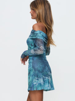 side view of model wearing Princess Polly Olympique Long Sleeve Mini Dress Blue Multi Straight Neck 