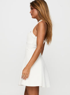side view of model wearing Princess Polly Alyn Halter Mini Dress White Square Neck 