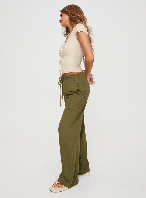 side view of model wearing Princess Polly Parklea Pants Sage Mid Rise Pants Pants 
