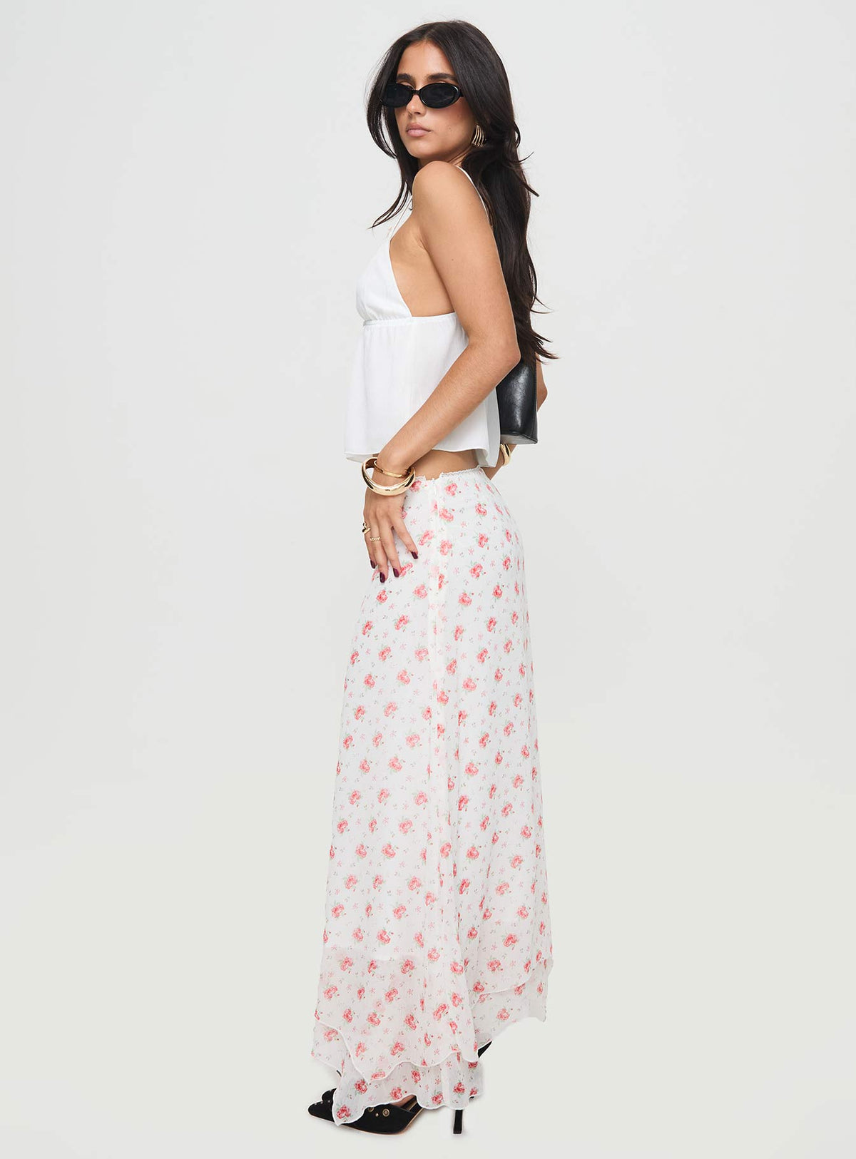   side view of model wearing Princess Polly Dancing In A Field Maxi Skirt Pink Floral Maxi Skirts Skirts 