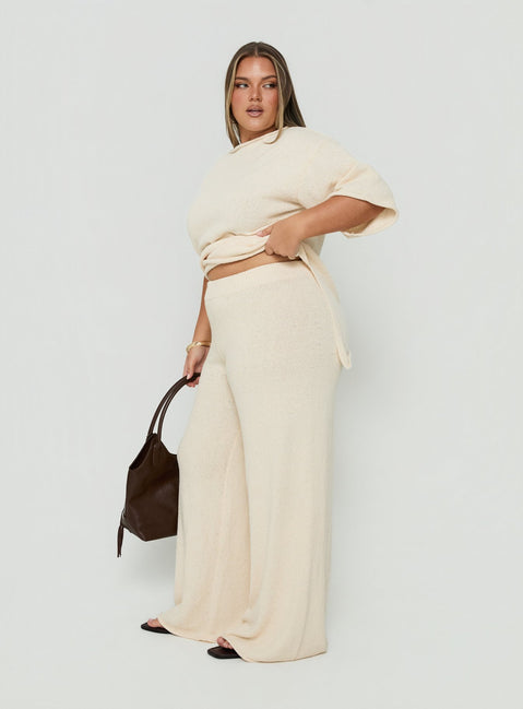 Presenting Calisse Knit Wide Leg Pants Beige Curve womens-regular-pants with high-rise side view of model wearing