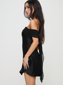 side view of model wearing Princess Polly Adoration Mini Dress Black Petite Straight Neck 