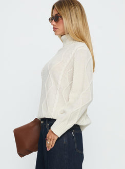 side view of model wearing Princess Polly Tarynne Cable Knit Turtle Neck Sweater Beige Longline Jumpers Jumpers 