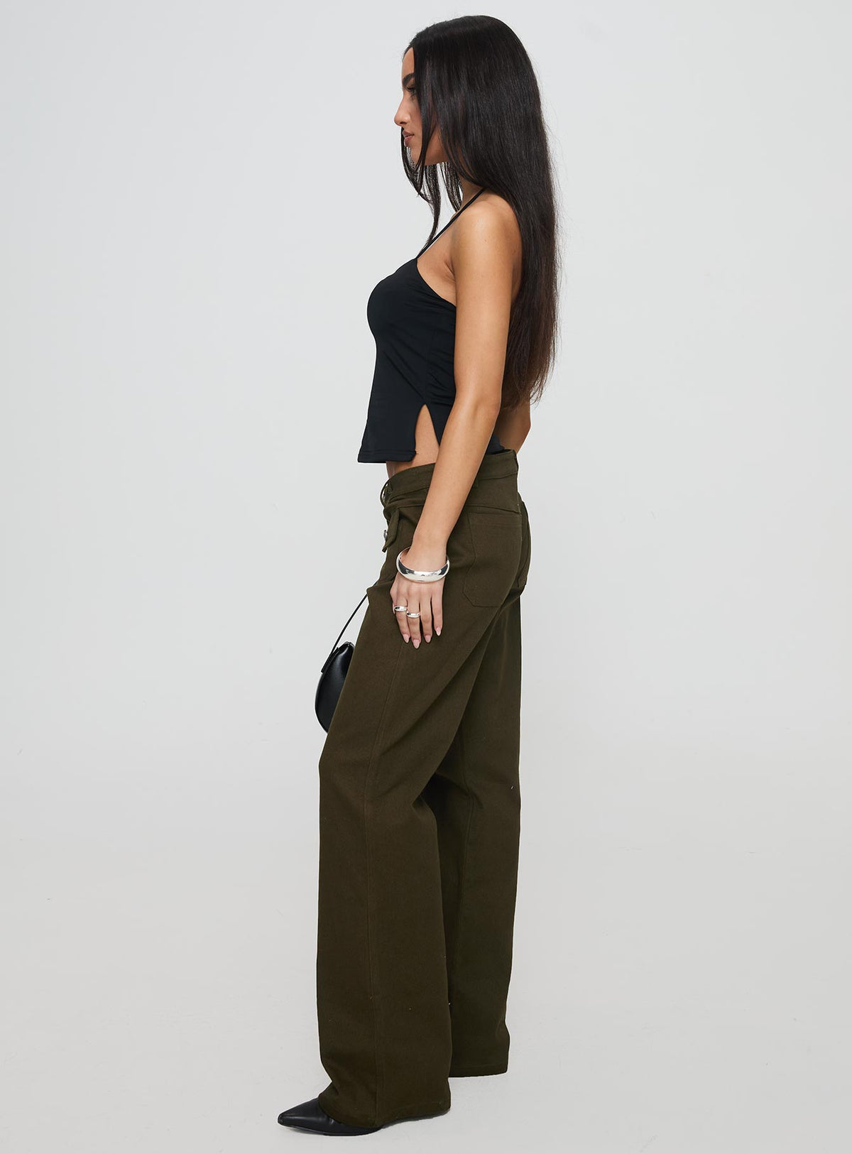 side view of model wearing Princess Polly Benicale Low Rise Cargo Pants Olive Pants 