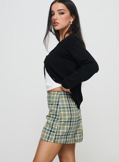   side view of model wearing Princess Polly Jacklin Mini Skirt Multi Check Mini Skirts Skirts 