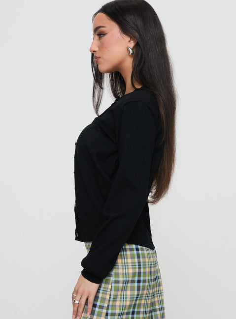 side view of model wearing Princess Polly Capeside Knit Cardigan Black Cropped Jumpers Jumpers 