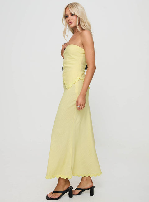   side view of model wearing Princess Polly Silvershore Maxi Skirt Yellow Maxi Skirts Skirts 