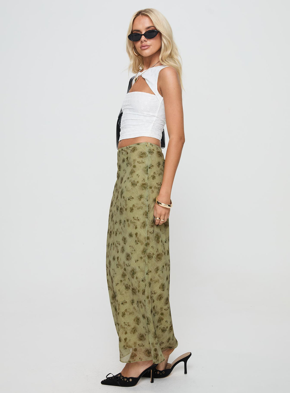   side view of model wearing Princess Polly Piazia Maxi Skirt Green Maxi Skirts Skirts 