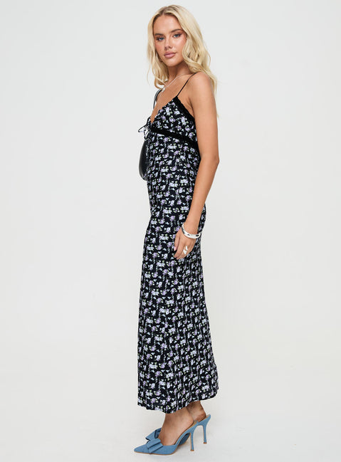 side view of model wearing Princess Polly Emily Maxi Dress Black / Floral Plunger 