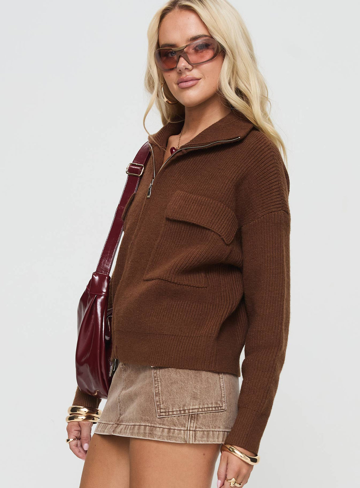 side view of model wearing Princess Polly Too Busy Zip Up Sweater Chocolate Cropped Jumpers Jumpers 