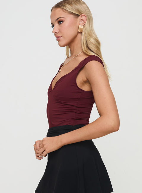 side view of model wearing Princess Polly Zenon Bodysuit Wine Sleeveless Bodysuit 