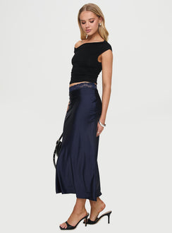   side view of model wearing Princess Polly The Charmaine Maxi Skirt Navy Midi Skirts Skirts 