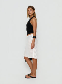 Presenting the Evangela Sheer Midi Skirt White Polka Dot womens-skirts in midi length side view of model wearing Princess Polly