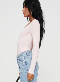 side view of model wearing Princess Polly Delgado Long Sleeve Bodysuit Pink Long Sleeve Tops Bodysuit 