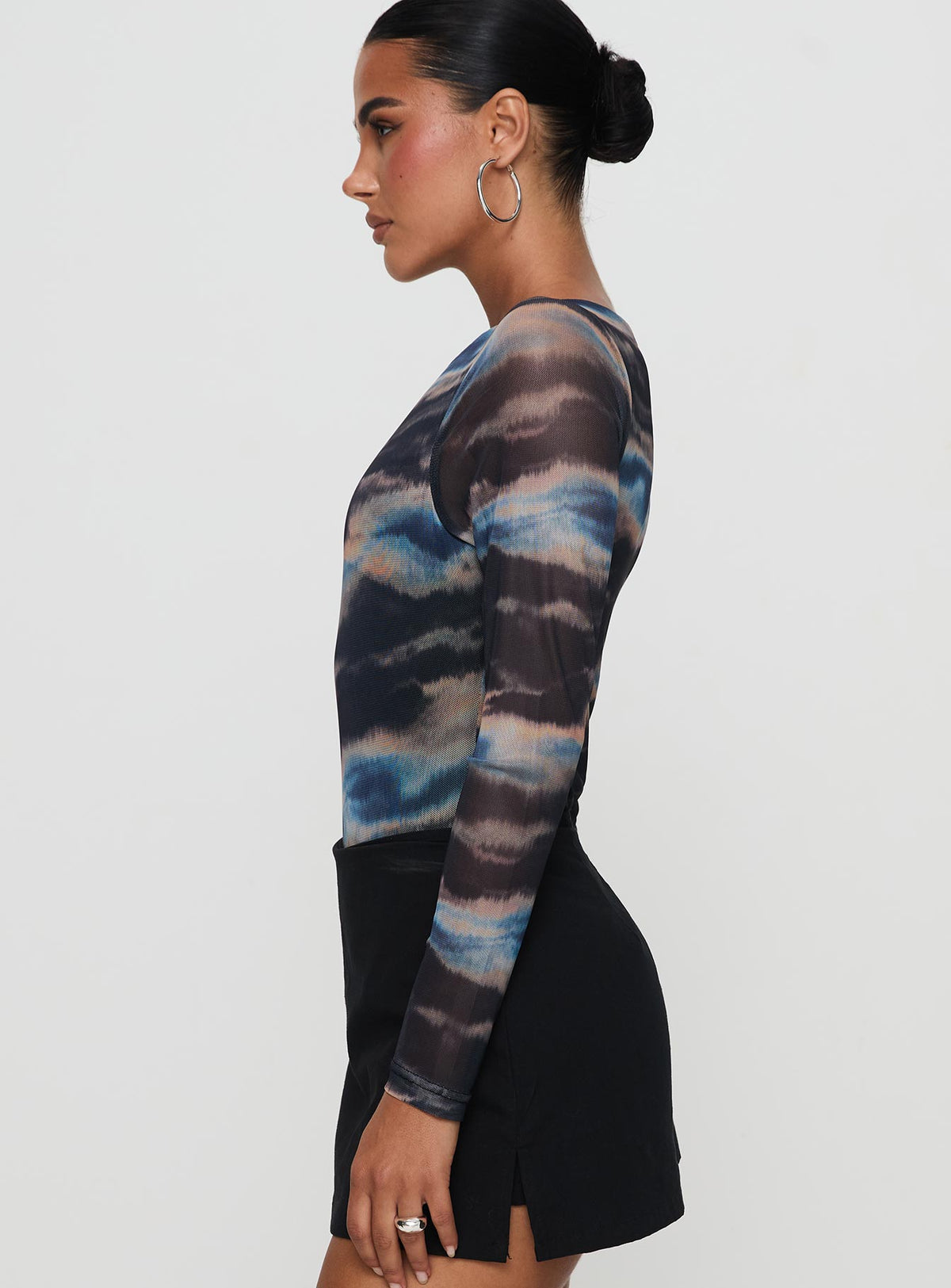 side view of model wearing Princess Polly Agate Long Sleeve Bodysuit Multi Long Sleeve Tops Bodysuit 
