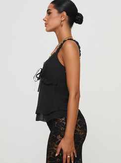 side view of model wearing Princess Polly Taini Top Black Sleeveless V-Neck 