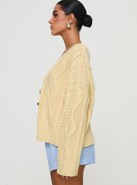 side view of model wearing Princess Polly Daxtan Cable Cardigan Lemon Cropped Jumpers Jumpers 