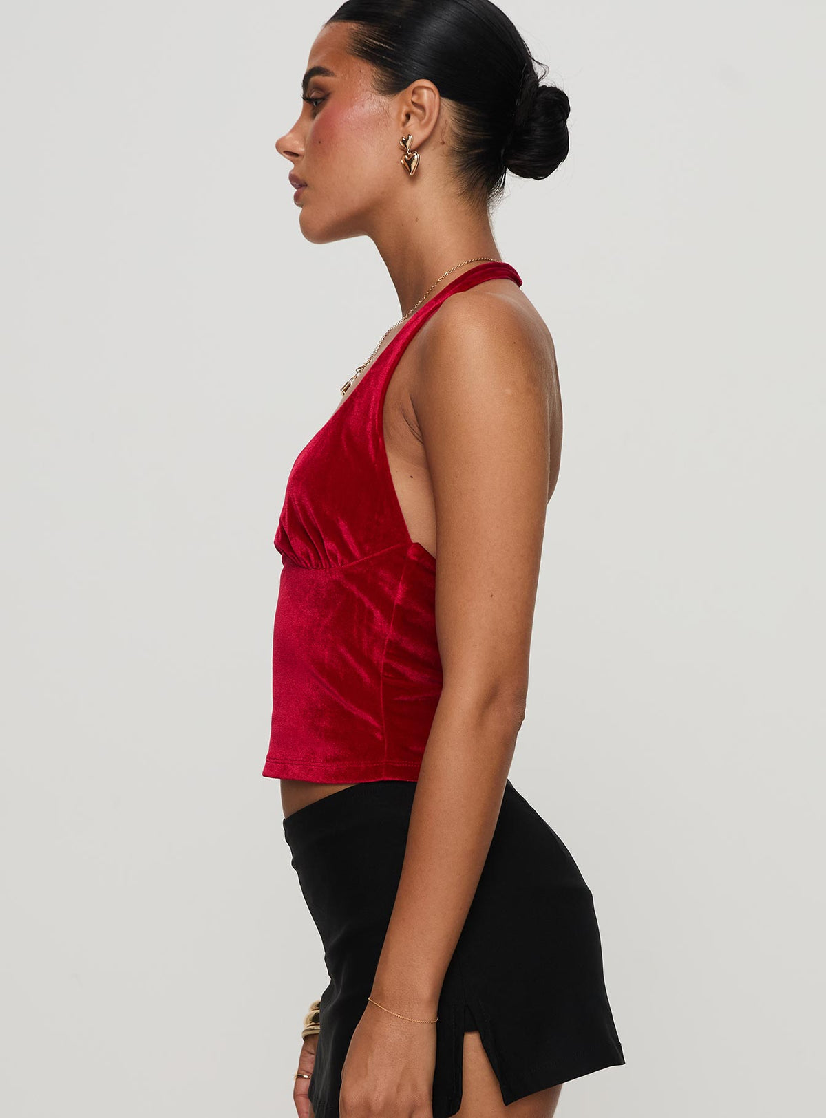 side view of model wearing Princess Polly Tuberose Halter Top Red Sleeveless V-Neck 