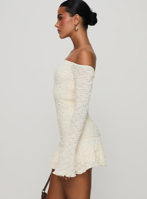 side view of model wearing Princess Polly Vancesca Strapless Mini Dress Cream Straight Neck 
