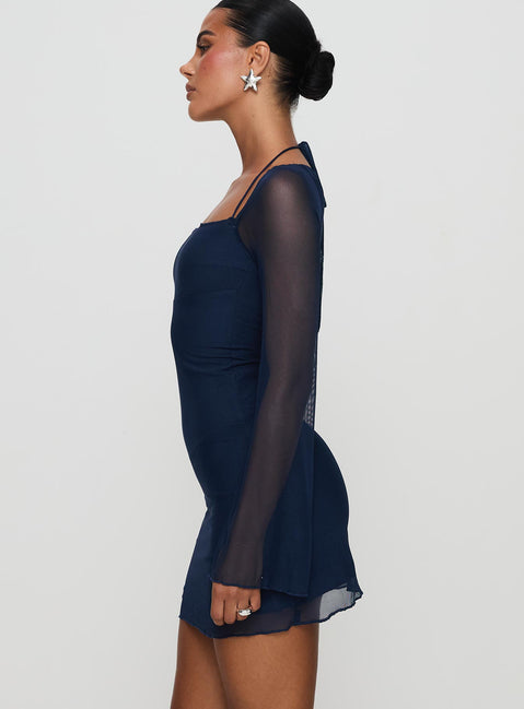 side view of model wearing Princess Polly Bilbao Long Sleeve Mini Dress Navy Square Neck 