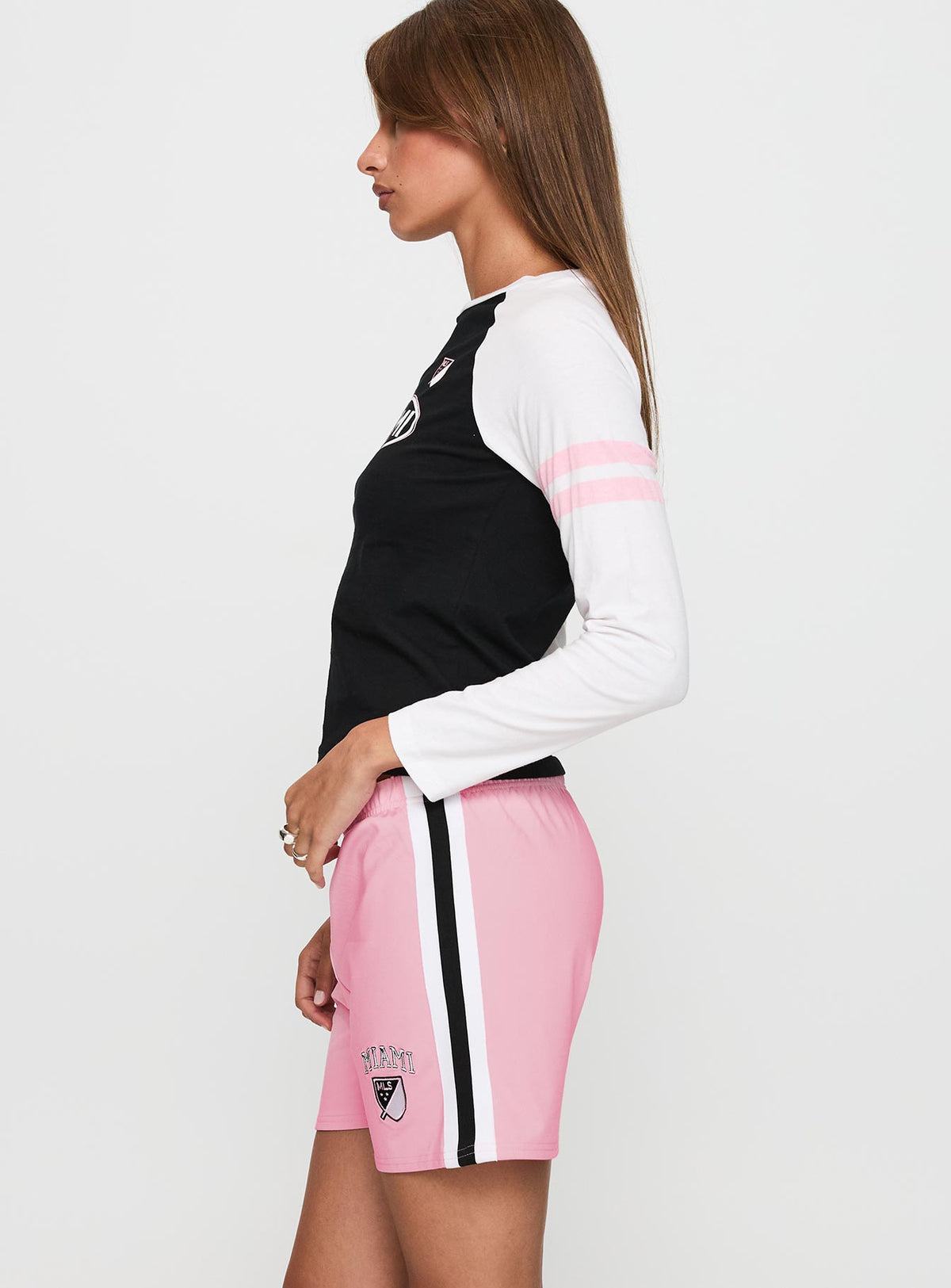side view of model wearing Princess Polly Bend It Athletic Shorts Pink Low Rise Shorts 
