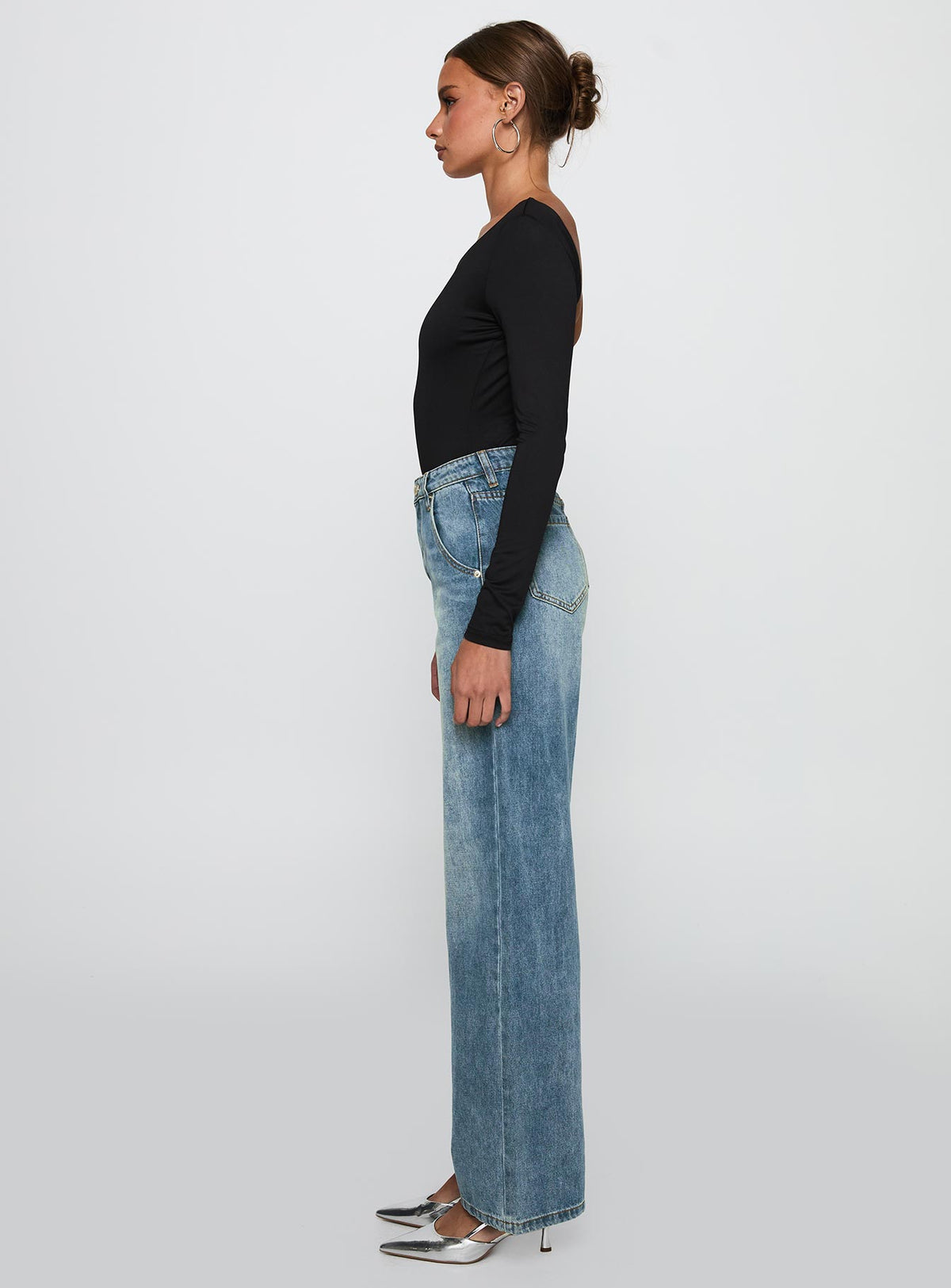 side view of model wearing Princess Polly Sacramento High Rise Straight Leg Jeans Mid Blue Denim High Rise Jeans Jeans 