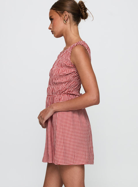 side view of model wearing Princess Polly Winxie Shirred Mini Dress Red Gingham Scoop Neck 