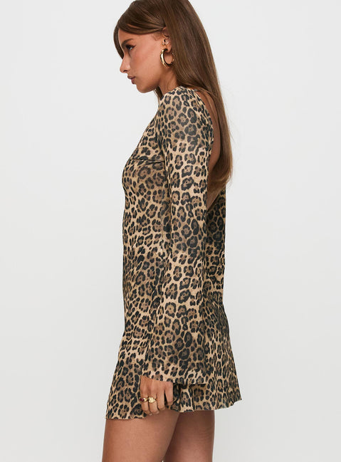 side view of model wearing Princess Polly Lukea Long Sleeve Mini Dress Leopard Boat Neck 