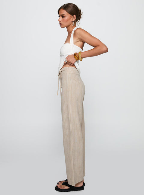 side view of model wearing Princess Polly Rush Hours Tie Up Pants Beige Pants 