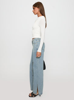 side view of model wearing Princess Polly White Mustang Mid Rise Straight Leg Jean Light Blue Mid Rise Jeans Jeans 