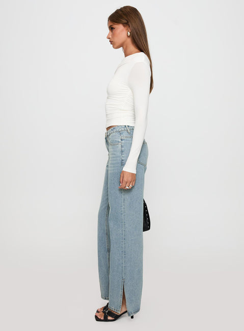side view of model wearing Princess Polly White Mustang Mid Rise Straight Leg Jean Light Blue Mid Rise Jeans Jeans 