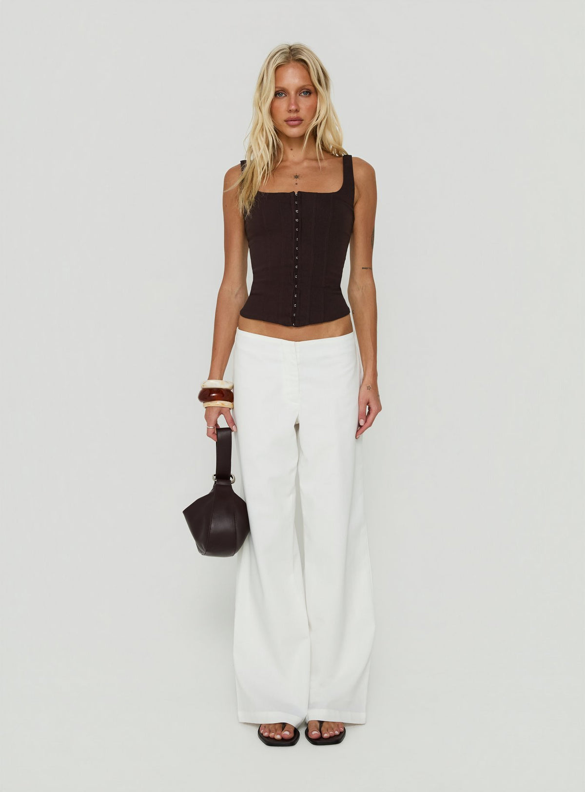 Presenting the Agazia No Waist Low Rise Straight Pants White in womens regular pants with low-rise on-body view of model wearing
