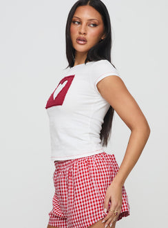 side view of model wearing Princess Polly Were Lovers Baby Tee White Short Sleeves Crew Neck 