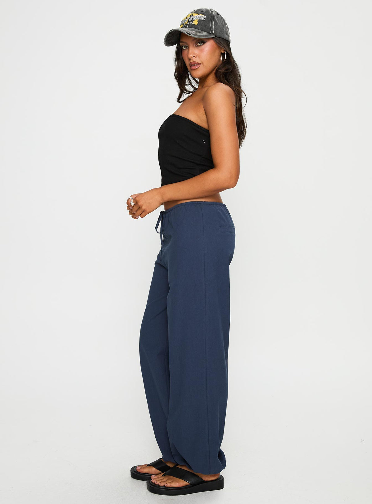 side view of model wearing Princess Polly Zodie Low Waist Pants Navy Low Rise Pants Pants 