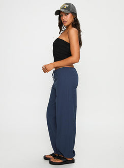 side view of model wearing Princess Polly Zodie Low Waist Pants Navy Low Rise Pants Pants 