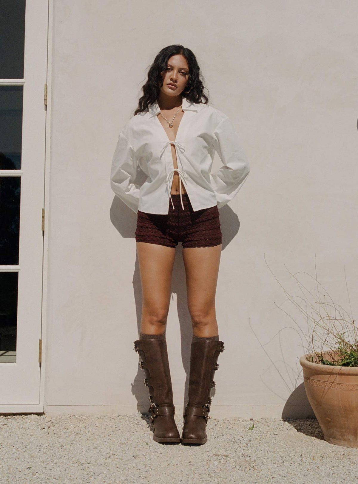 back view of model wearing Princess Polly Angelis Lace Shorts Chocolate High Waisted Shorts 