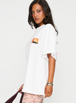 side view of model wearing Princess Polly Matchbox Collection Graphic Top White / Multi Half Sleeves Crew Neck 