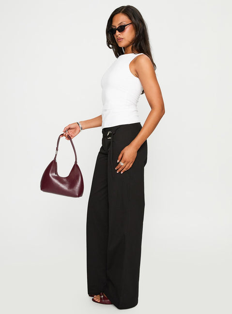 side view of model wearing Princess Polly Lucetta Wide Leg Pant Black Low Rise Pants 