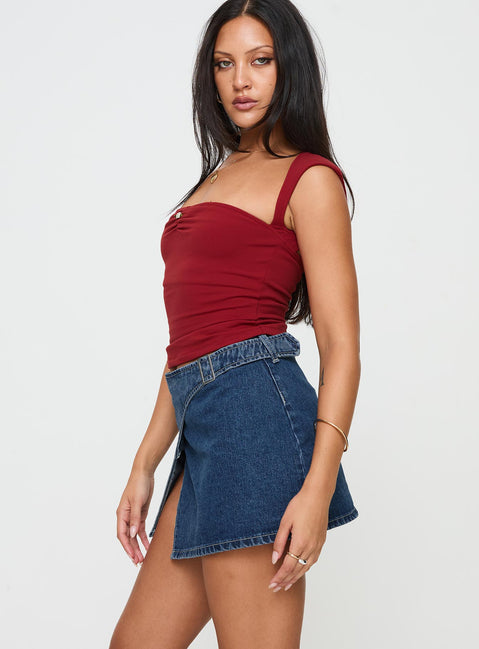   side view of model wearing Princess Polly Wait Up Denim Wrap Mini Skirt Mid Wash Mini Skirts Skirts 