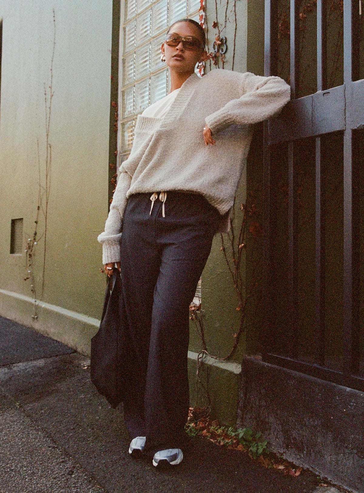 side view of model wearing Princess Polly Mich Knit Sweater Beige Jumpers 
