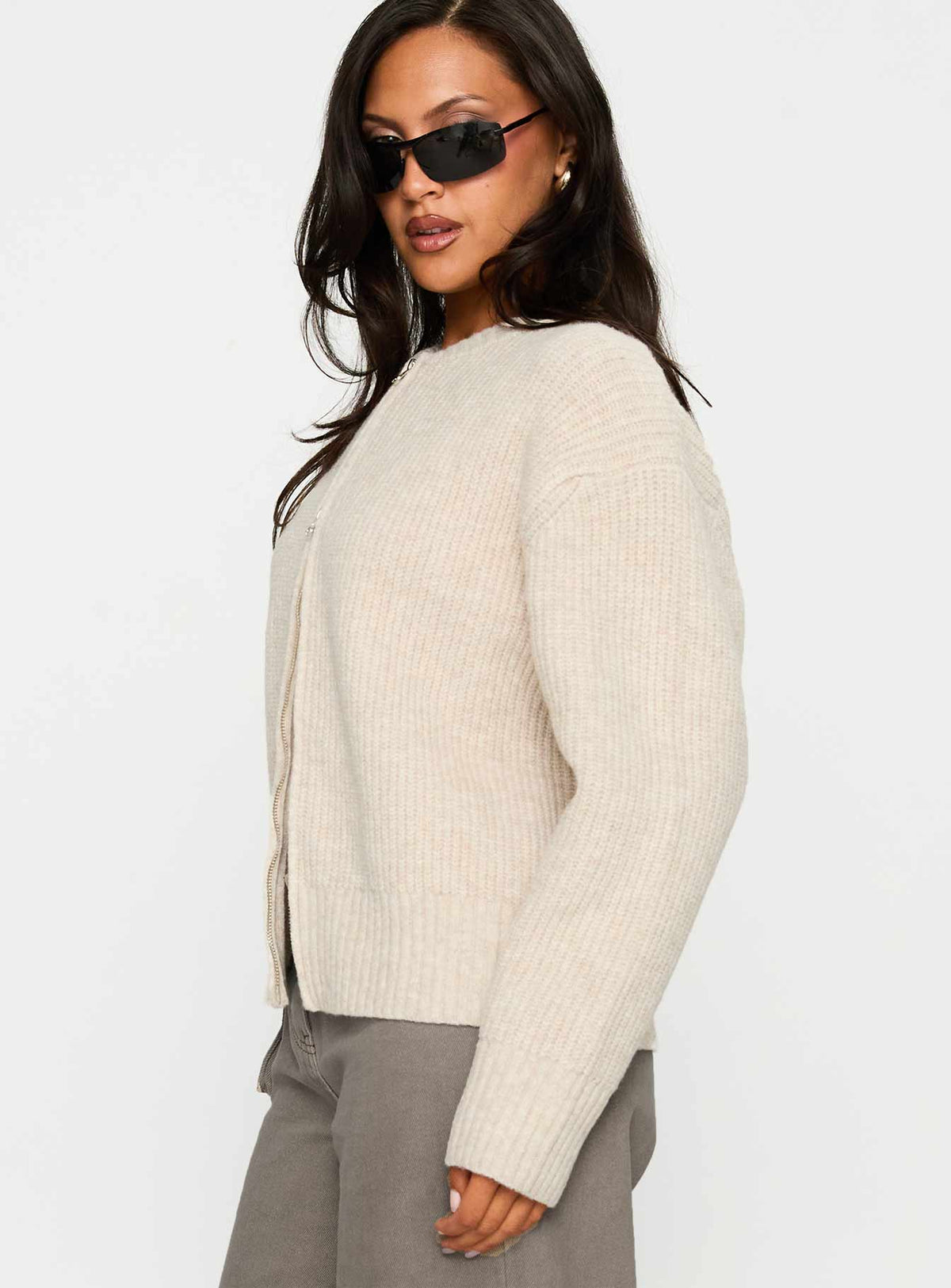 side view of model wearing Princess Polly Lexene Zip Through Jumper Oat Cropped Jumpers Jumpers 